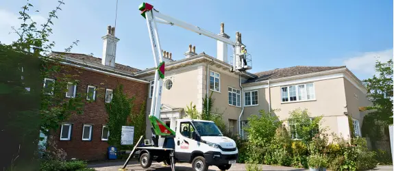 using our cherry picker on a commercial gutter cleaning job in Filwood, Plymouth